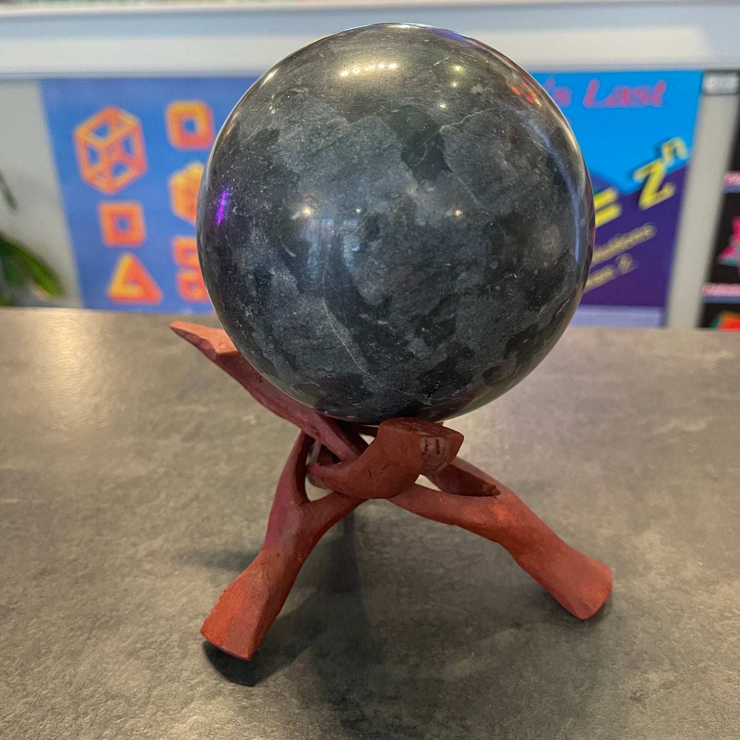 Polished Stone Sphere with Standing