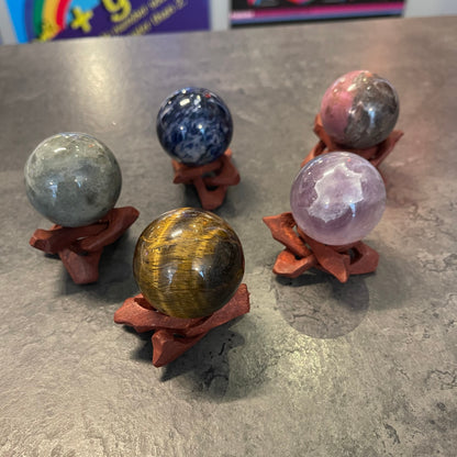 Crystal Spheres on Wooden Stands