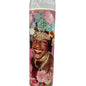 Candle with a colorful design featuring a smiling person and flowers on a white background