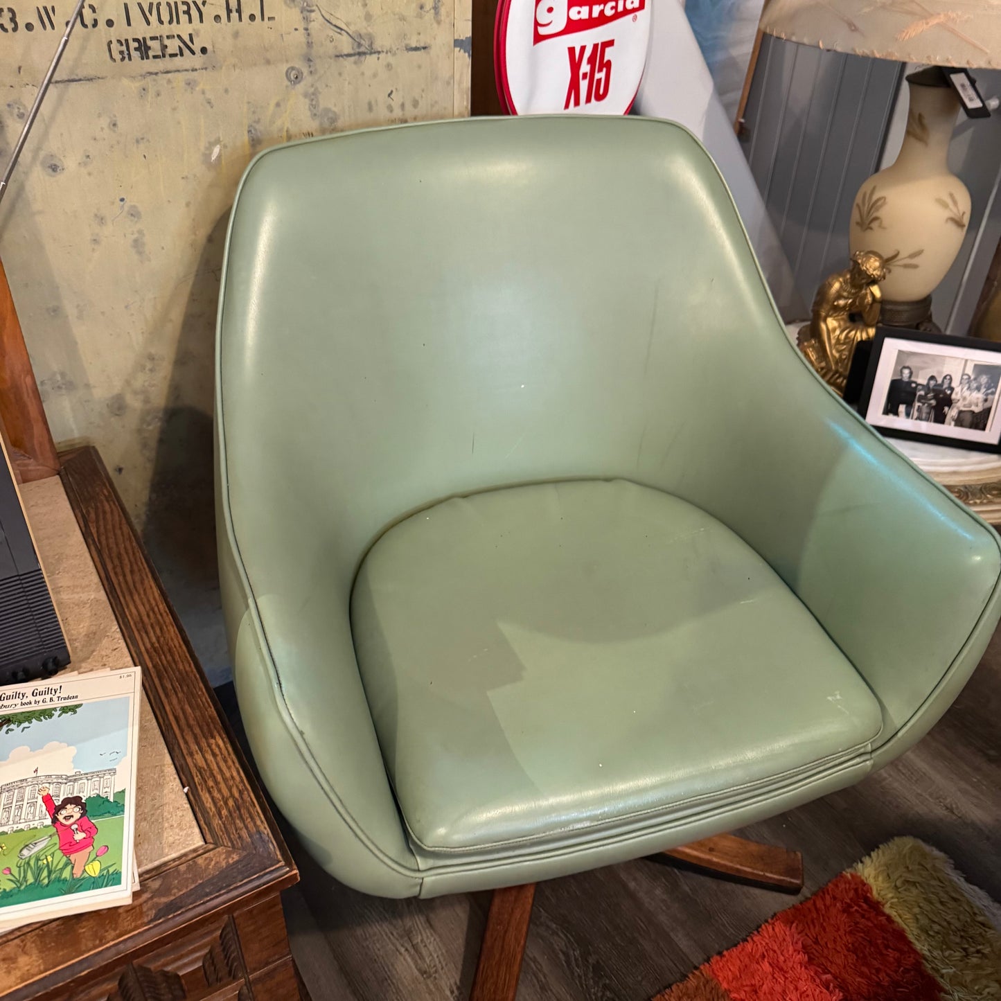 Pair of Mid-Century Modern Green Vinyl Swivel Armchairs with Teak & Steel Base