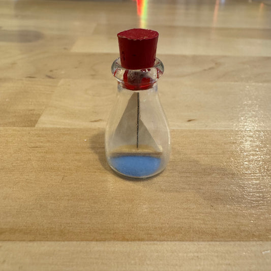 Sailboat in Tiny Bottle
