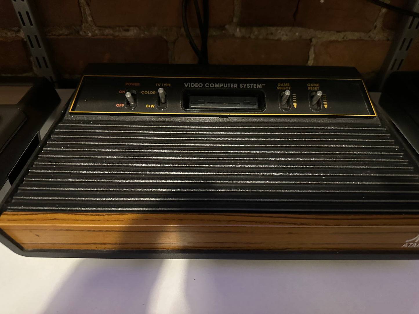 Atari 2600 'Woody' Console with/2 Controllers/2 Paddles