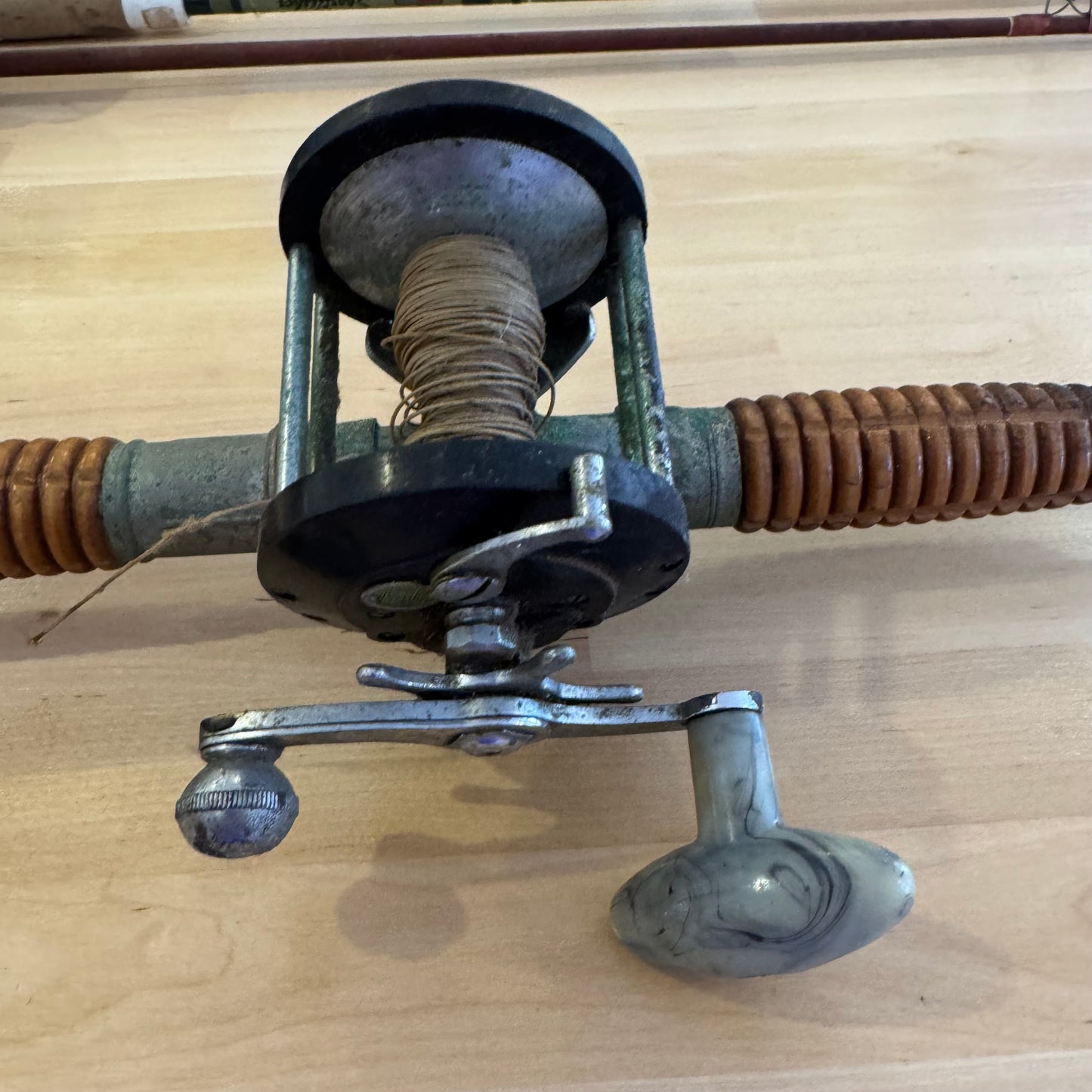 Vintage Wooden Fishing Rod paired with an Ocean City No. 935 Baitcasting Reel