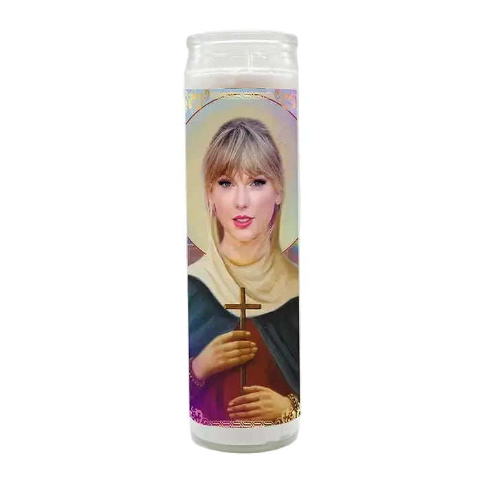 Candle with a portrait of a person holding a cross on a white background